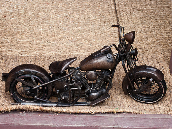 This little metallic replica of a motorcycle seemed so out of place at the gift shop